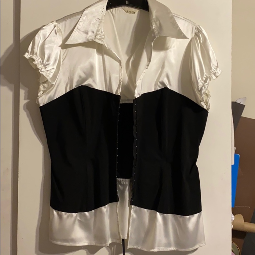 Corset type top with hook and eye closure